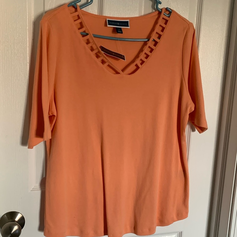 Karen Scott ladies blouse. Color- pacific coral